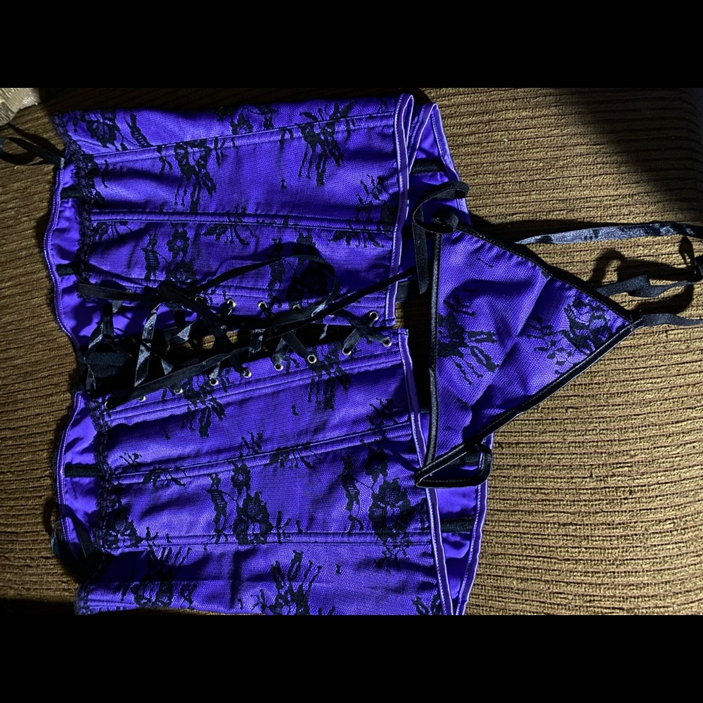 NWOT.  From Rouge and Roses in Purple and Black.  Tag reads 5x but US size is 3x